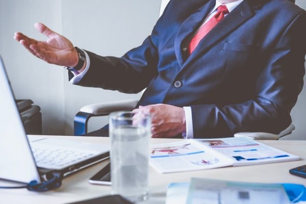 Business sitting at a table and talking