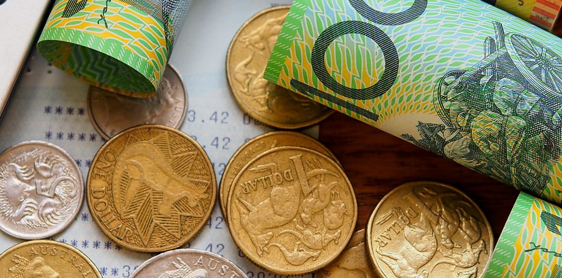 coins and bills on a table