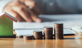 counting coins on table