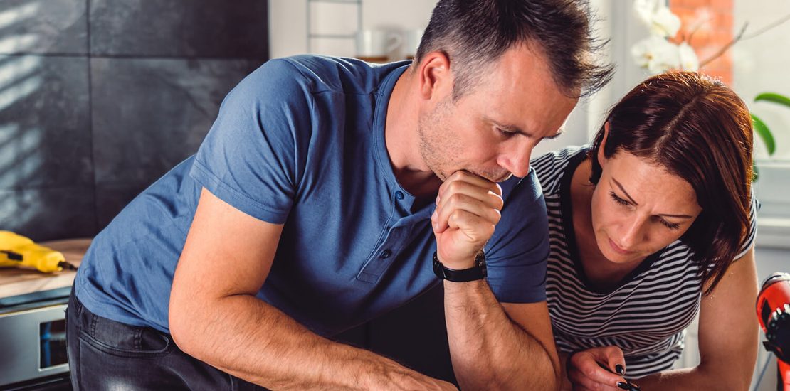 couple making plans in home