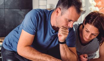 couple making plans in home