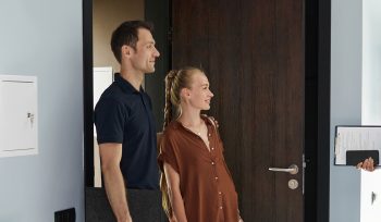 young couple doing house inspection with agent