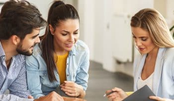 man and women doing finance